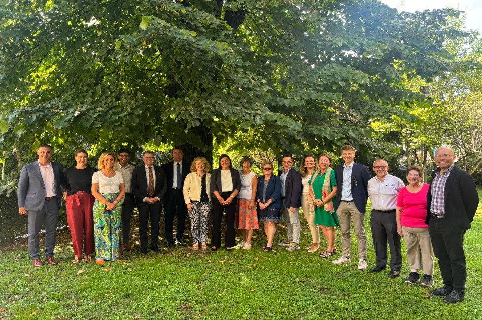 the centre with the Rector Prof Beccalli, Chair of the Management Board
